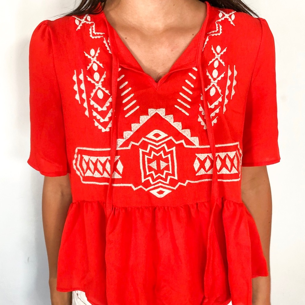 Embroidered peplum top!